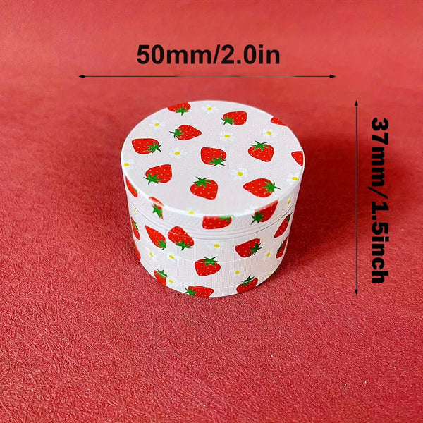 Strawberry-shaped herb grinder by BudBabes, front view